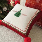 Housses de coussin imprimés avec pompons (lot de 2)