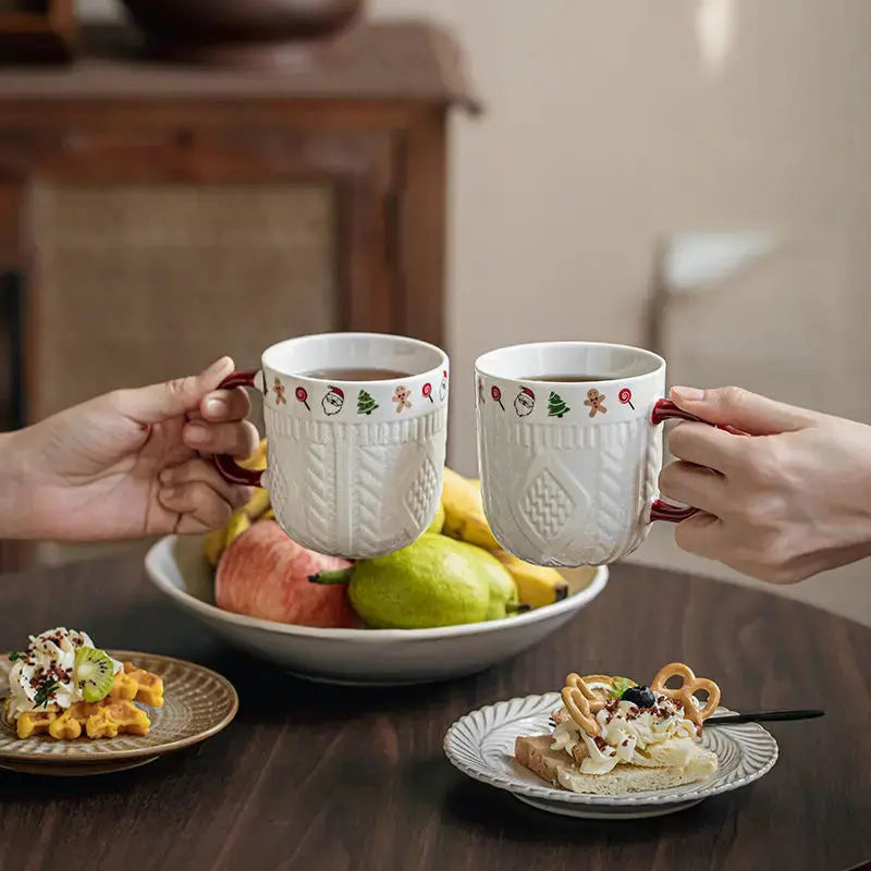 Mugs de Noël en céramique effet pull tricoté avec motifs festifs Fééries Mancelya