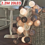 Lanterne de 20 boules en rotin LED de noël Fééries Mancelya